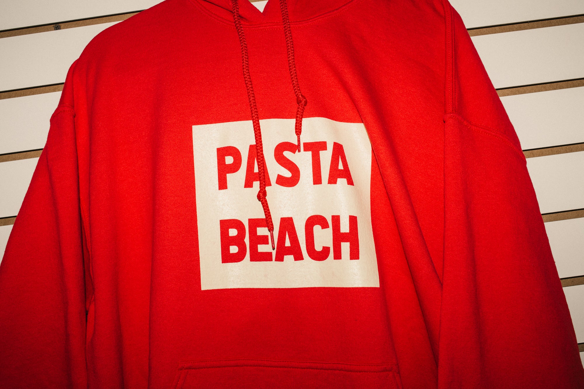Pasta Beach Red Hoodie Waterfront Views